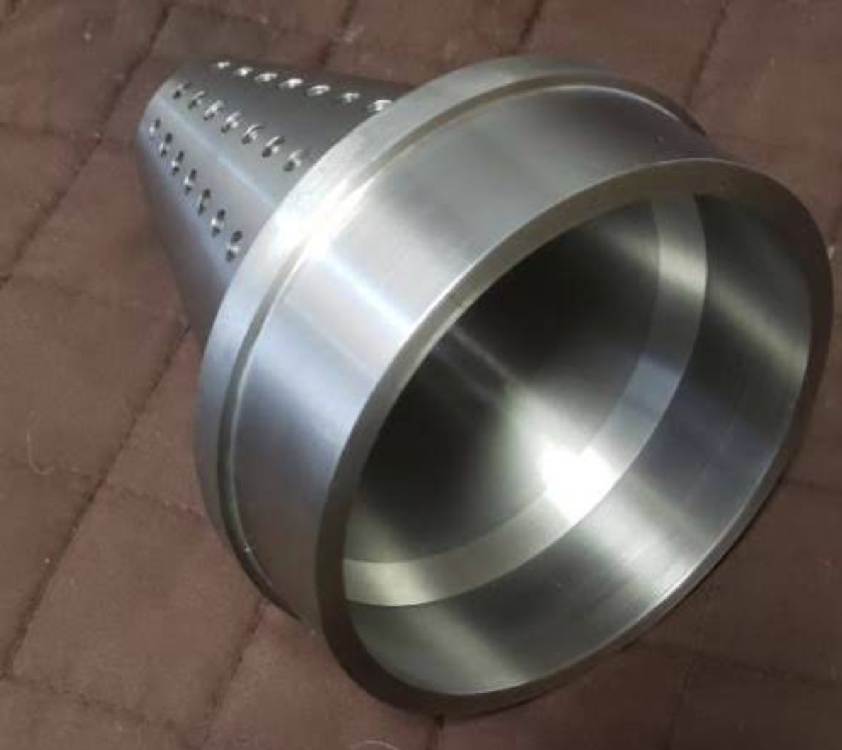 Conical machined metal component with precision-drilled hole pattern