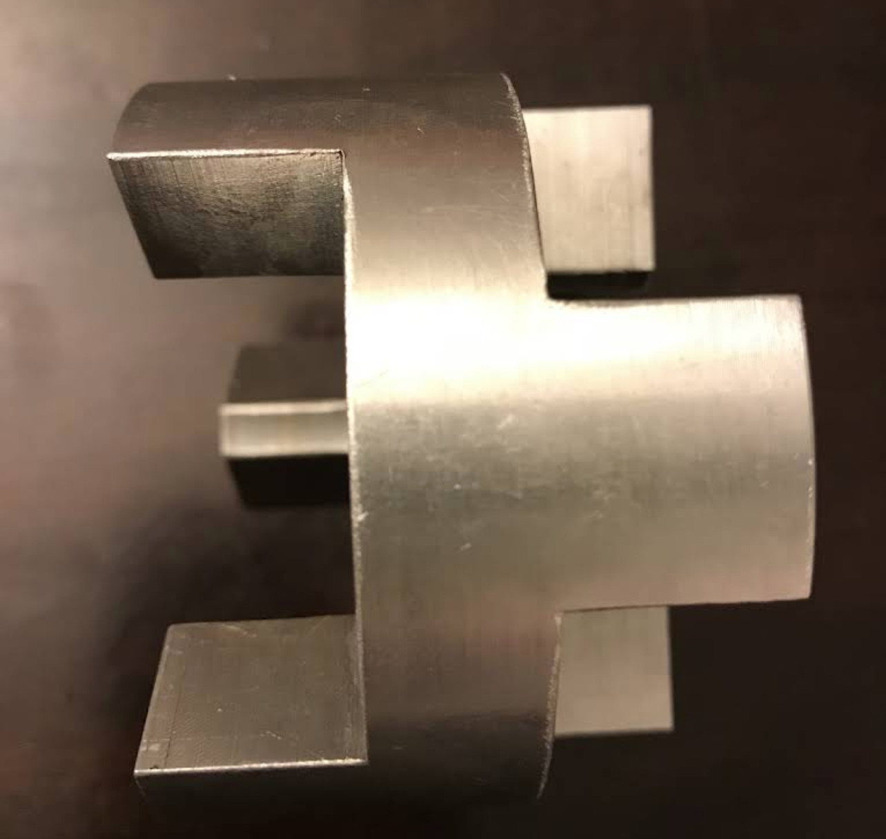 Close-up of a machined stepped steel block
